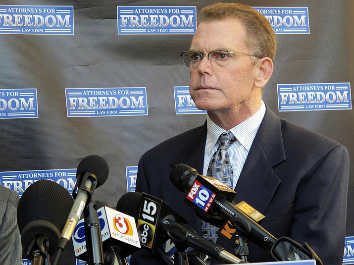 In this Feb. 2, 2018 file photo, Douglas Haig takes questions from reporters at a news conference in Chandler, Ariz. Federal prosecutors say a jury, not a judge, should hear the Las Vegas trial of an Arizona man facing a federal ammunition-manufacturing charge after selling bullets to the gunman who staged the deadliest mass shooting in modern U.S. history. A court filing on Tuesday, June 25, 2019 leaves it to a judge to decide. Haig's lawyers asked for a bench trial, arguing that jurors can't fairly hear evidence in a city where 58 people died and more than 850 were injured in October 2017. (Brian Skoloff/AP, file)