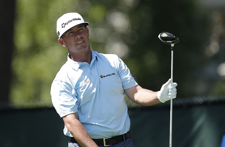 Former Arizona State standout Chez Reavie watches his drive on the 11th hole during the first round of the Rocket Mortgage Classic golf tournament Thursday, June 27, 2019, in Detroit. (Carlos Osorio/AP)