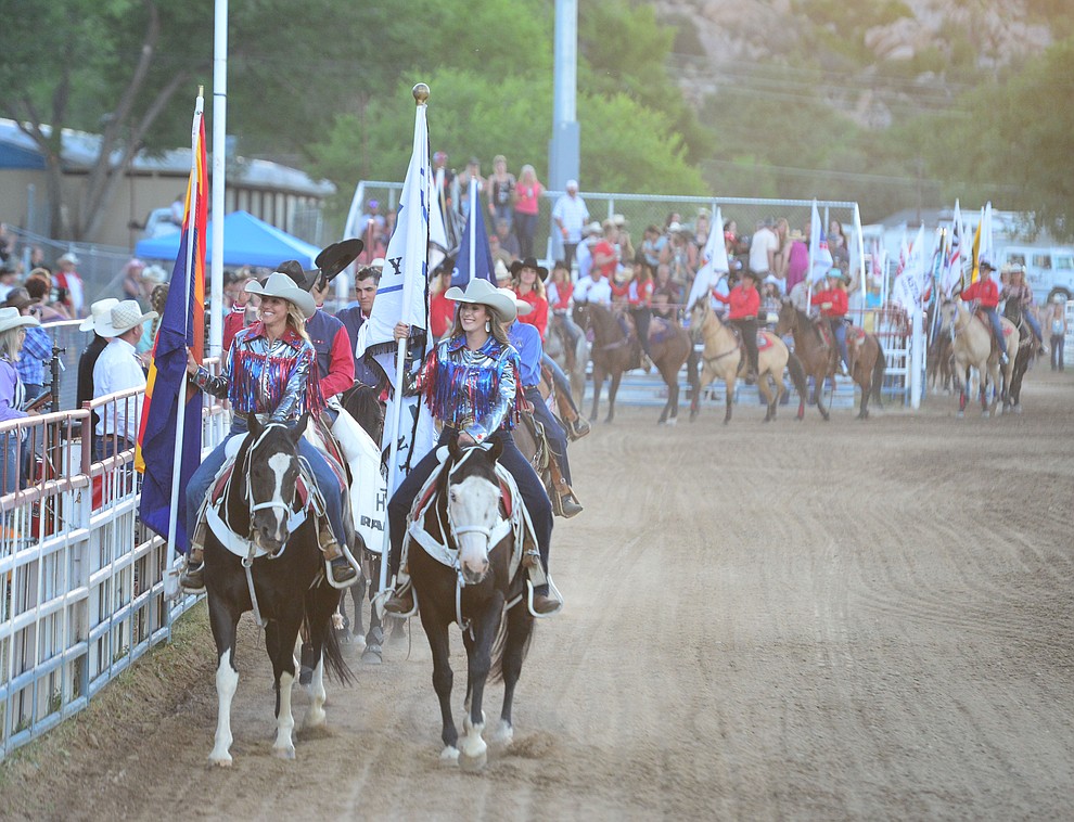 The Grand Entry kicks off the first performance of the Prescott Frontier Days Rodeo Monday July 1, 2019. (Les Stukenberg/Courier)