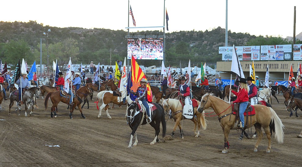The Grand Entry kicks off the first performance of the Prescott Frontier Days Rodeo Monday July 1, 2019. (Les Stukenberg/Courier)