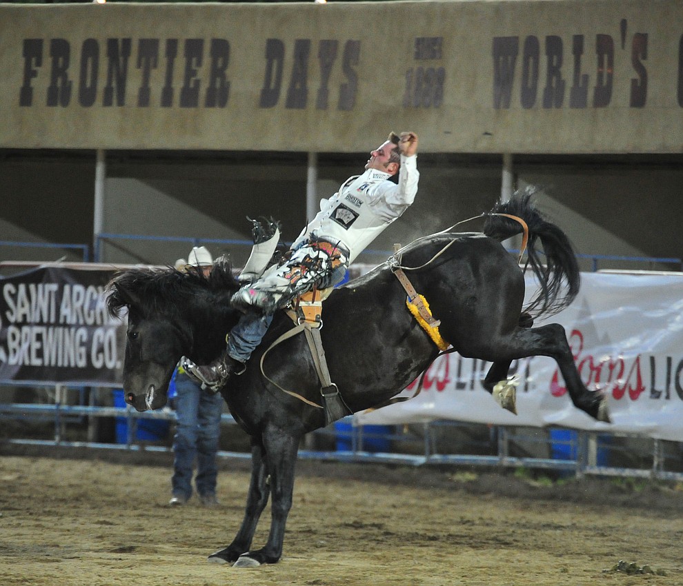 Austin Foss scores 81 on Excalibur in the bareback riding during the first performance of the Prescott Frontier Days Rodeo Monday July 1, 2019. (Les Stukenberg/Courier)