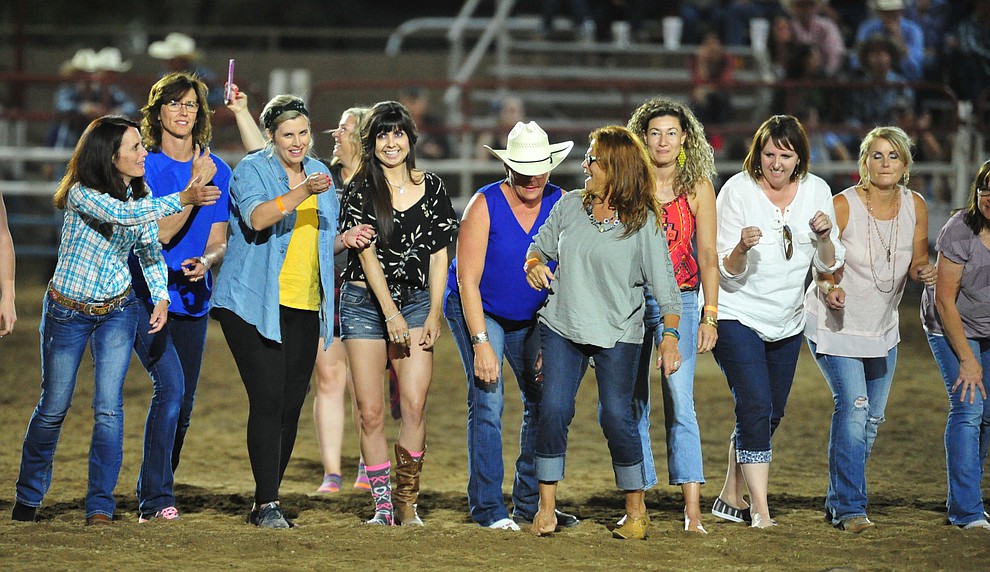 Ladies chased their boot for a chance at $250 during the first performance of the Prescott Frontier Days Rodeo Monday July 1, 2019. (Les Stukenberg/Courier)