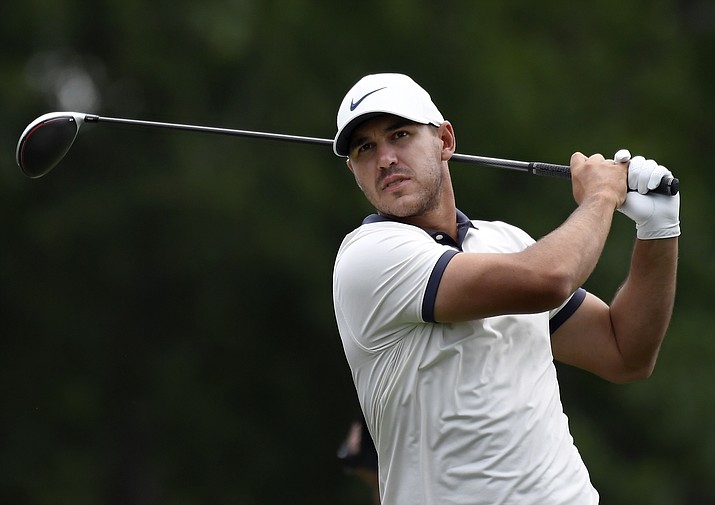 Brooks Koepka hits off the 18th tee during the third round of the Travelers Championship golf tournament, Saturday, June 22, 2019, in Cromwell, Conn. (Jessica Hill/AP)