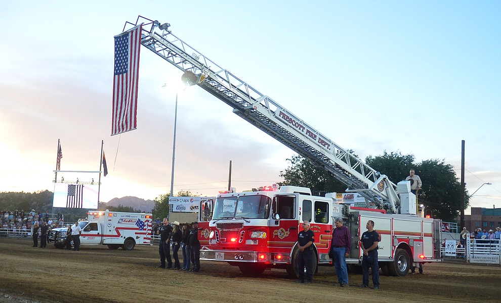 First responders from Prescott area agencies were honored during the third performance of the Prescott Frontier Days Rodeo Wednesday July 3, 2019. (Les Stukenberg/Courier)
