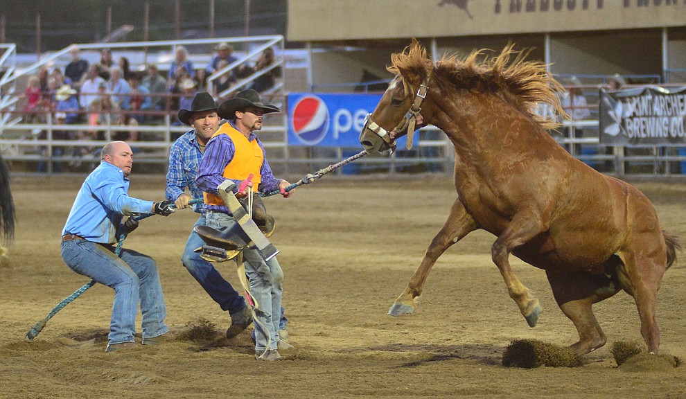 Wild Horse Race/Extreme Bronc riding action during the third performance of the Prescott Frontier Days Rodeo Wednesday July 3, 2019. (Les Stukenberg/Courier)