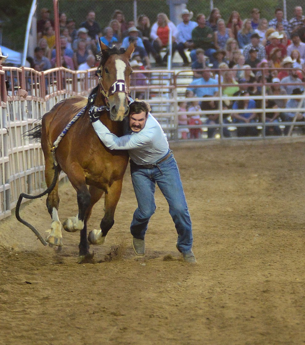 Wild Horse Race/Extreme Bronc riding action during the third performance of the Prescott Frontier Days Rodeo Wednesday July 3, 2019. (Les Stukenberg/Courier)