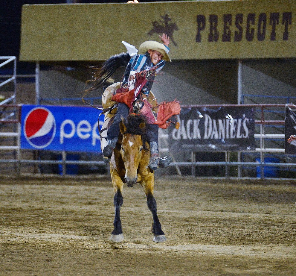 Earl Tsosie Jr. scores 68 on Happy Trails in the bareback riding during the third performance of the Prescott Frontier Days Rodeo Wednesday July 3, 2019. (Les Stukenberg/Courier)