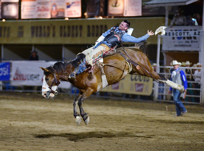 Logan Patterson scores 88 on Pow Wow Rocks to take the lead in the bareback riding during the third performance of the Prescott Frontier Days Rodeo Wednesday July 3, 2019.  (Les Stukenberg/Courier)
