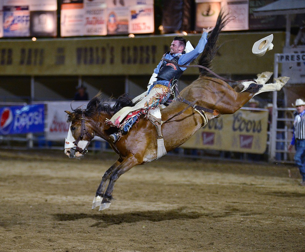 Logan Patterson scores 88 on Pow Wow Rocks to take the lead in the bareback riding during the third performance of the Prescott Frontier Days Rodeo Wednesday July 3, 2019. (Les Stukenberg/Courier)