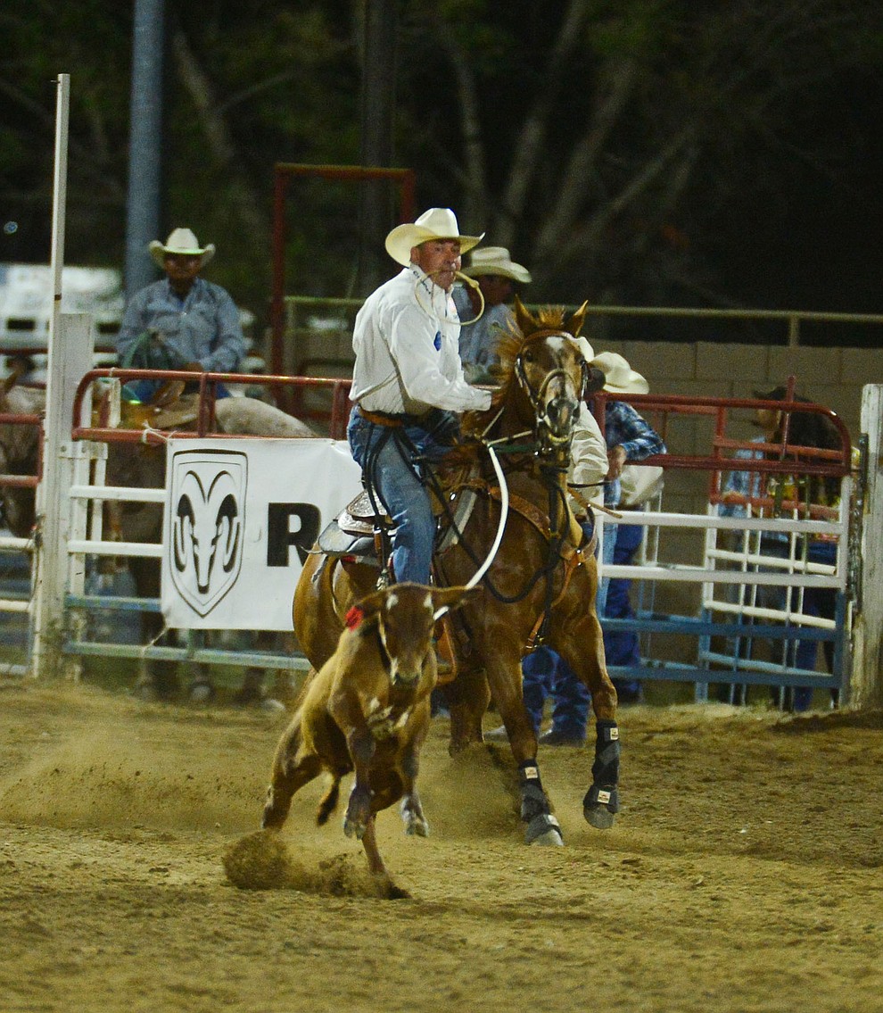 Paul Carmen in the tie down roping during the third performance of the Prescott Frontier Days Rodeo Wednesday July 3, 2019. (Les Stukenberg/Courier)
