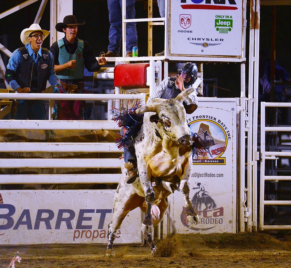 Wyatt Austin on Dances with Monsters in the bull riding during the third performance of the Prescott Frontier Days Rodeo Wednesday July 3, 2019. (Les Stukenberg/Courier)