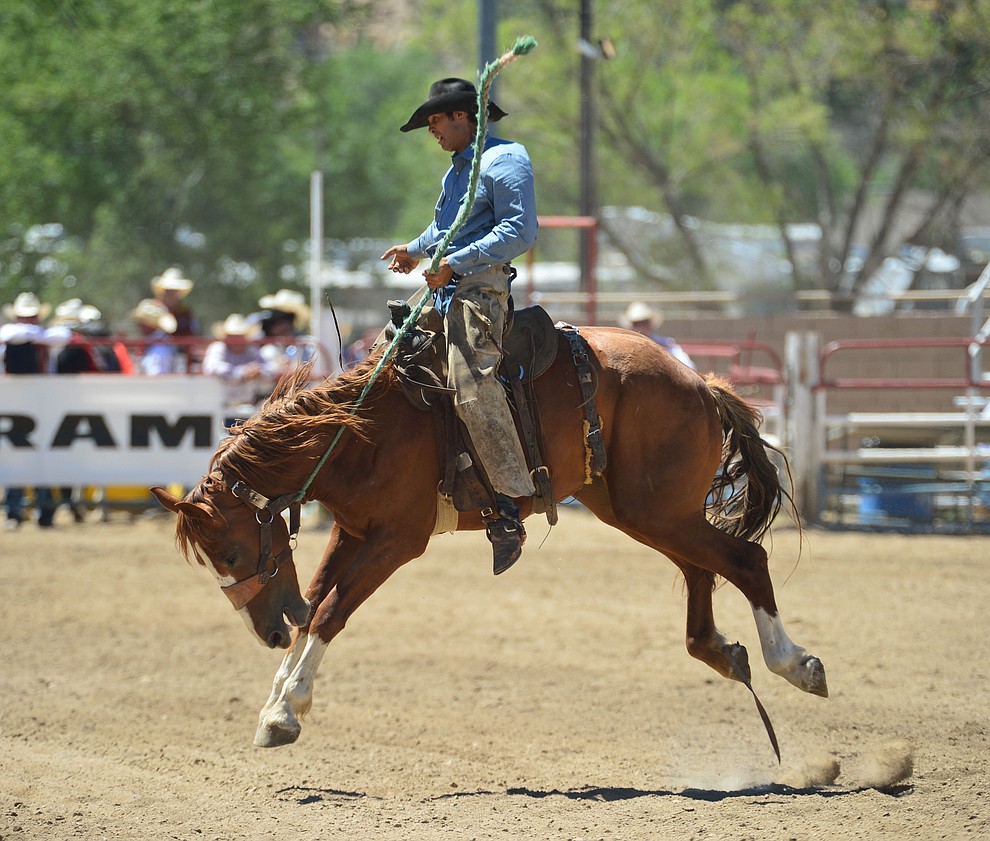Logan Westcott in the Cowpunchers Bronc Riding during the fourth performance of the Prescott Frontier Days Rodeo Thursday July 4, 2019. (Les Stukenberg/Courier)