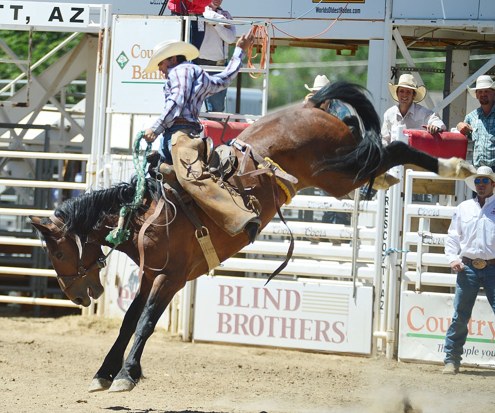Huckleberry Sandsness in the Cowpunchers Bronc Riding during the fourth performance of the Prescott Frontier Days Rodeo Thursday July 4, 2019. (Les Stukenberg/Courier)