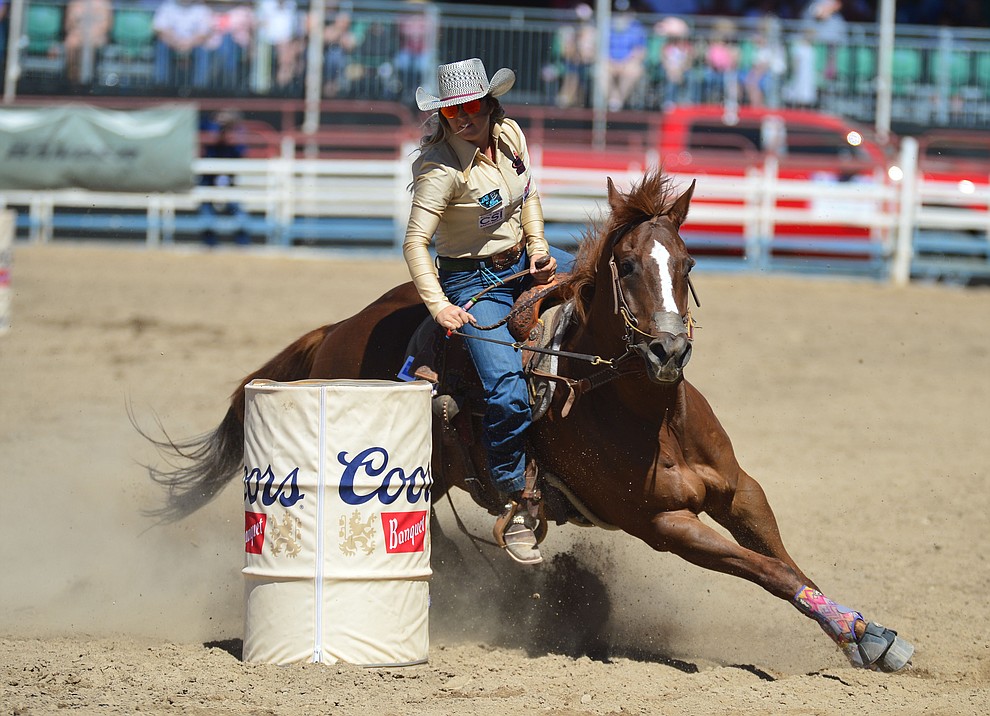 Cheyenne Lindsey in the barrel racing during the fourth performance of the Prescott Frontier Days Rodeo Thursday July 4, 2019. (Les Stukenberg/Courier)