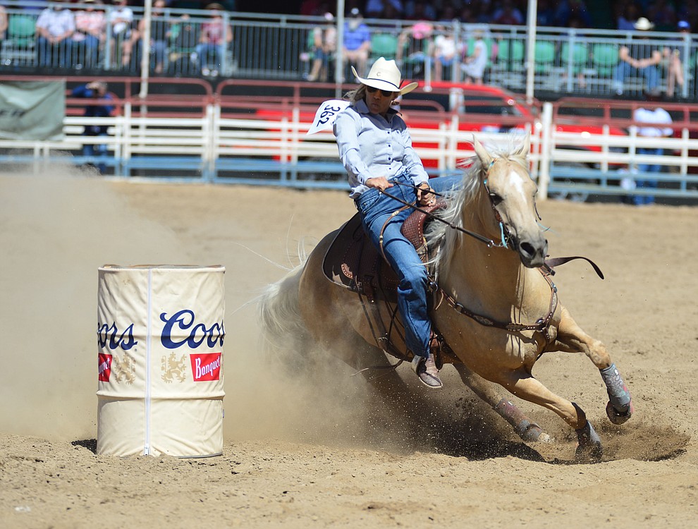 Julie Miller in the barrel racing during the fourth performance of the Prescott Frontier Days Rodeo Thursday July 4, 2019. (Les Stukenberg/Courier)