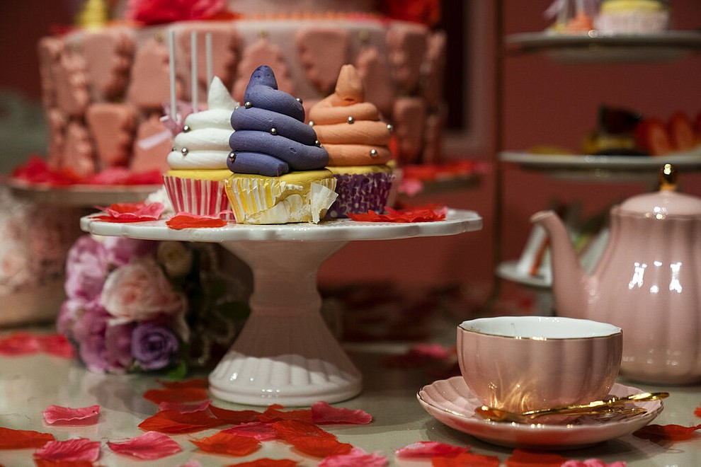 In this Tuesday, June 18, 2019, photo, poop-shaped cupcakes are displayed in a room at the Unko Museum in Yokohama, south of Tokyo. In a country known for its cult of cute, even poop is not an exception. A pop-up exhibition at the Unko Museum in the port city of Yokohama is all about unko, a Japanese word for poop. The poop installations there get their cutest makeovers. They come in the shape of soft cream, or cupcake toppings. (AP Photo/Jae C. Hong)