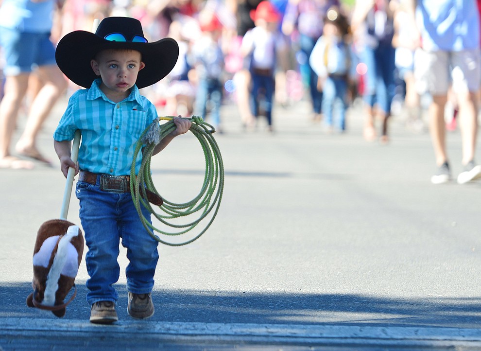 A little roper during the 78th annual Kiwanis Kiddie Parade along Cortez Street in downtown Prescott Friday July 5, 2019. (Les Stukenberg/Courier)
