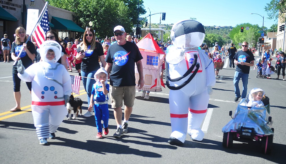 The Barney family celebrates the lunar landing during the 78th annual Kiwanis Kiddie Parade along Cortez Street in downtown Prescott Friday July 5, 2019. (Les Stukenberg/Courier)