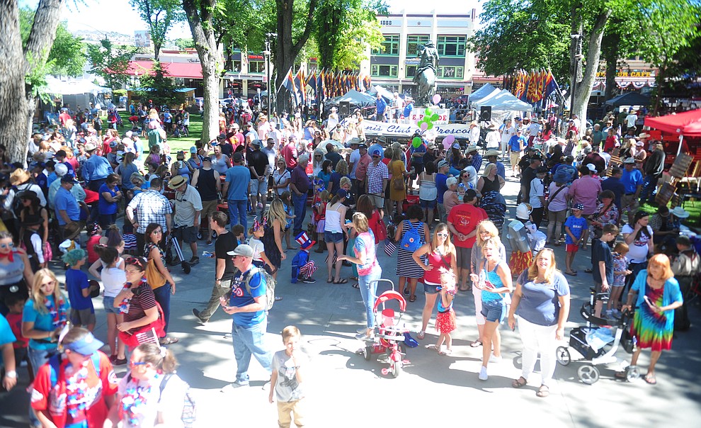 A large crowd gathers on the Courthouse Plaza following the 78th annual Kiwanis Kiddie Parade along Cortez Street in downtown Prescott Friday July 5, 2019. (Les Stukenberg/Courier)