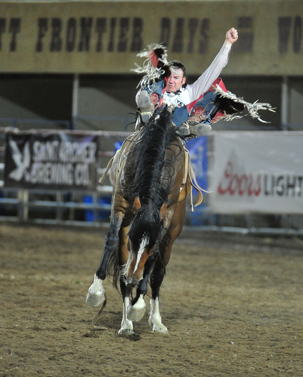 Steven Peebles rides Wrangler Valley in the bareback riding during the 5th performance of the Prescott Frontier Days Rodeo at the Prescott Rodeo grounds Friday July 5, 2019. (Les Stukenberg/Courier)