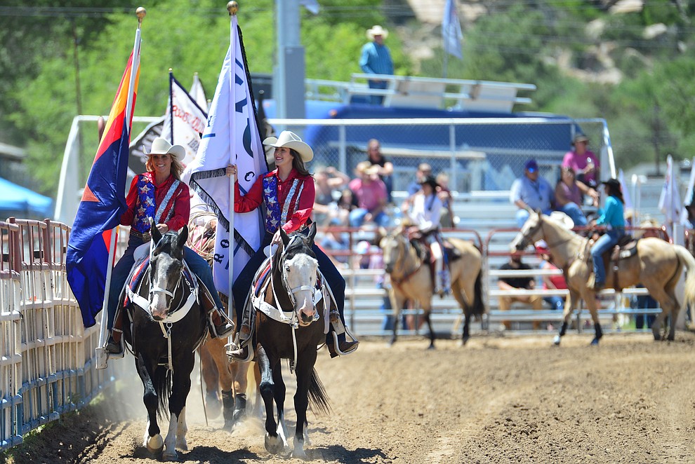 The Grand Entry begins during the 6th performance of the Prescott Frontier Days Rodeo Saturday afternoon July 6, 2019. (Les Stukenberg/Courier)