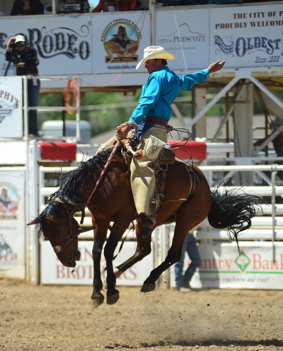 Brett Behrends scores 74 on Kevin's Pride in the Cowpunchers Bronc Riding during the 6th performance of the Prescott Frontier Days Rodeo Saturday afternoon July 6, 2019. (Les Stukenberg/Courier)
