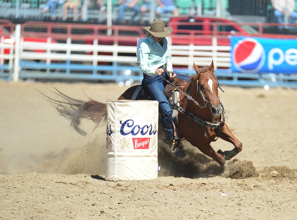 Megan Champion runs 17.82 in the barrel race during the 6th performance of the Prescott Frontier Days Rodeo Saturday afternoon July 6, 2019. (Les Stukenberg/Courier)