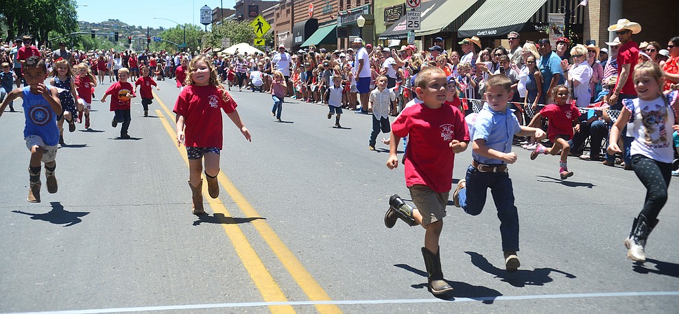 Four to five year olds race during the 37th annual Whiskey Row Boot Race on Montezuma Street in Prescott Saturday July 6, 2019. (Les Stukenberg/Courier)