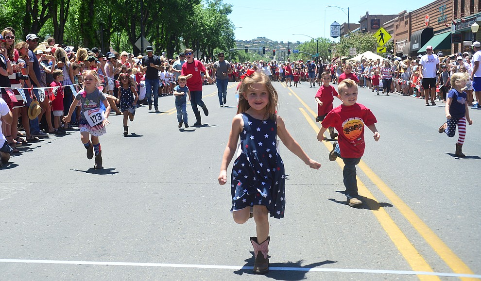 Four to five year olds race during the 37th annual Whiskey Row Boot Race on Montezuma Street in Prescott Saturday July 6, 2019. (Les Stukenberg/Courier)