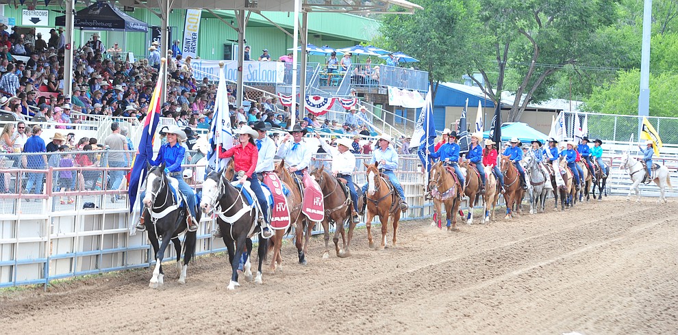 The Grand Entry opens the final performance of the Prescott Frontier Days Rodeo Sunday July 7, 2019. (Les Stukenberg/Courier)