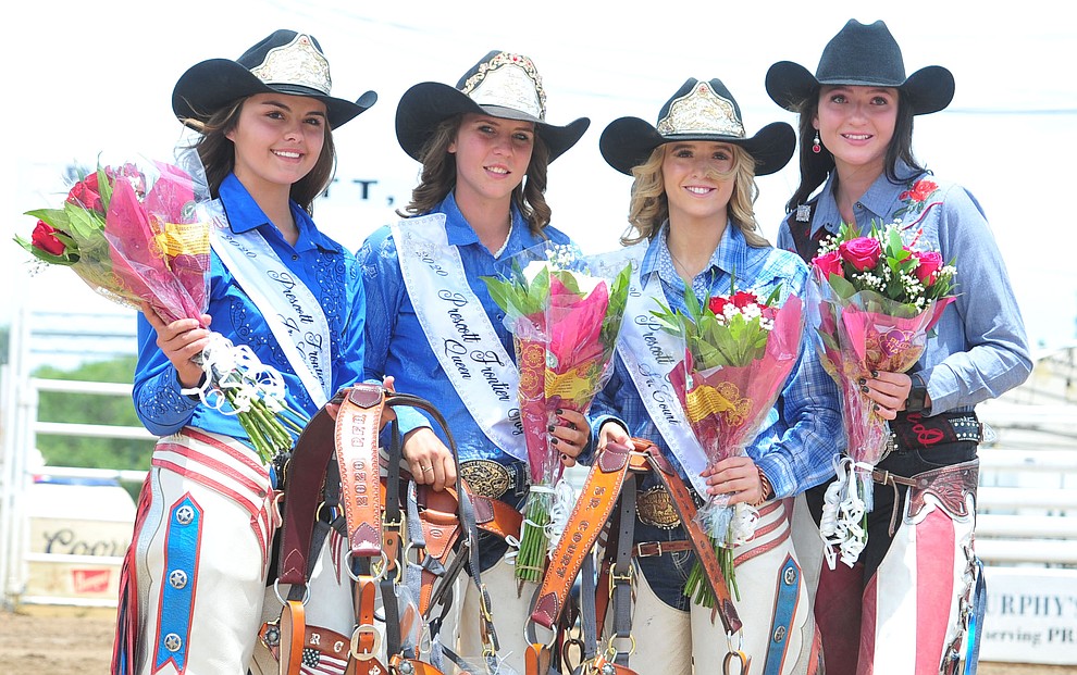 2019 Prescott Frontier Days Queen Sarah Grant, at right, poses with new Prescott Frontier Days 2020 royalty, from left, Junior Court Shayna Hawkins, Queen Desiree Johnson and Senior Court Kenzly Skipper Sunday July 7, 2019. (Les Stukenberg/Courier)