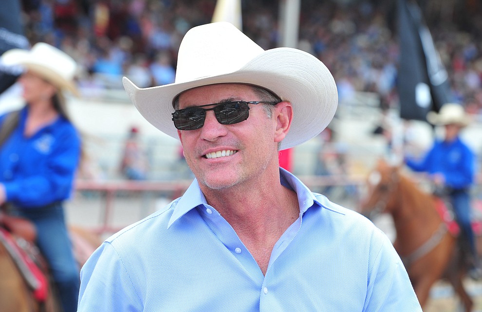 Prescott Mayor Greg Mengarelli rides in the Grand Entry during the final performance of the Prescott Frontier Days Rodeo Sunday July 7, 2019. (Les Stukenberg/Courier)