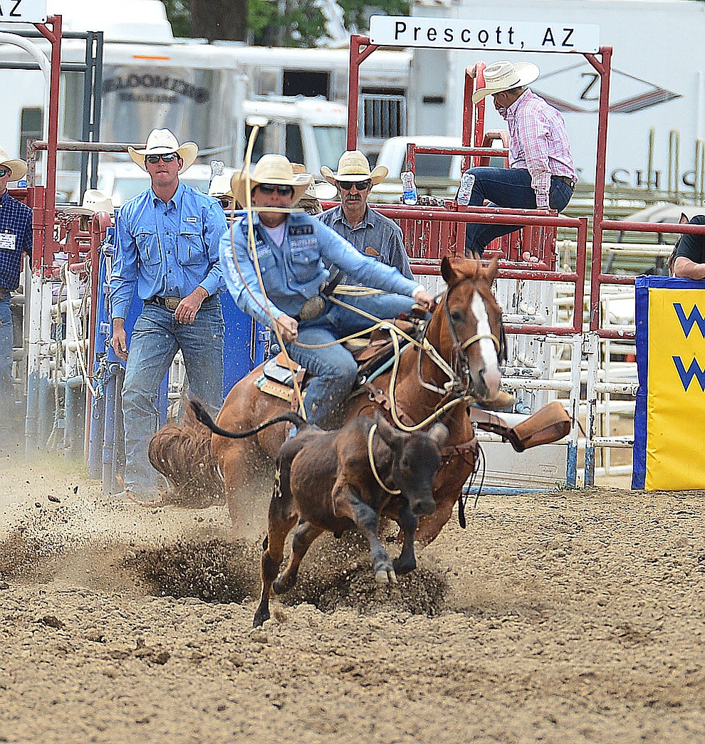 Tanner Green has a 10.4 second run in the tie down roping during the final performance of the Prescott Frontier Days Rodeo Sunday July 7, 2019. (Les Stukenberg/Courier)