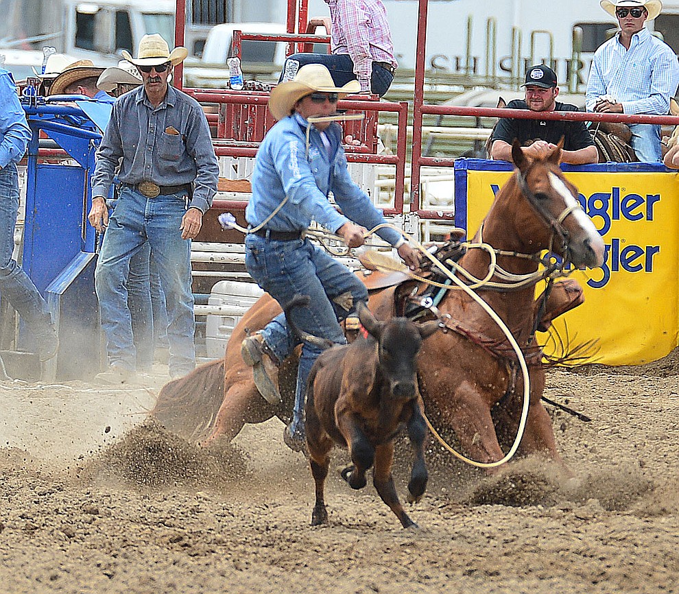 Tanner Green has a 10.4 second run in the tie down roping during the final performance of the Prescott Frontier Days Rodeo Sunday July 7, 2019. (Les Stukenberg/Courier)
