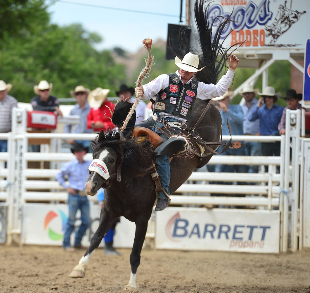 Jacobs Crawley scores 82 on Sky Fall in the saddle bronc riding during the final performance of the Prescott Frontier Days Rodeo Sunday July 7, 2019. (Les Stukenberg/Courier)
