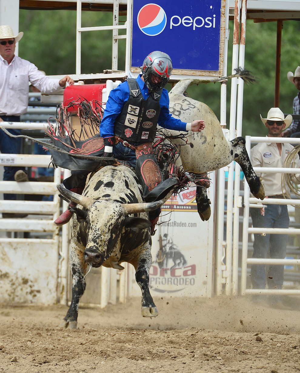 Cole Melancon on Happy Days in the bull riding during the final performance of the Prescott Frontier Days Rodeo Sunday July 7, 2019. (Les Stukenberg/Courier)