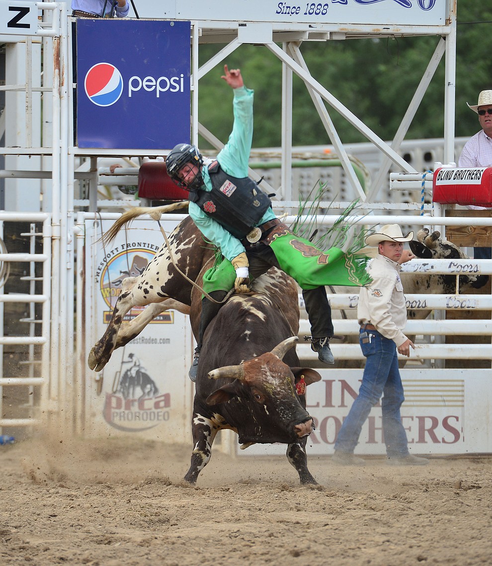 Braden Richardson scores 86 on Icy Hot in the bull riding during the final performance of the Prescott Frontier Days Rodeo Sunday July 7, 2019. (Les Stukenberg/Courier)