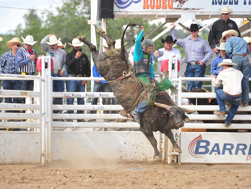 Josh Frost on House of Pain in the bull riding during the final performance of the Prescott Frontier Days Rodeo Sunday July 7, 2019. (Les Stukenberg/Courier)