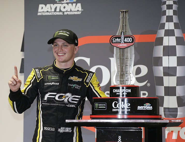 Justin Haley poses for photos with his trophy after winning a NASCAR Cup Series auto race at Daytona International Speedway, Sunday, July 7, 2019, in Daytona Beach, Fla. (Terry Renna/AP)