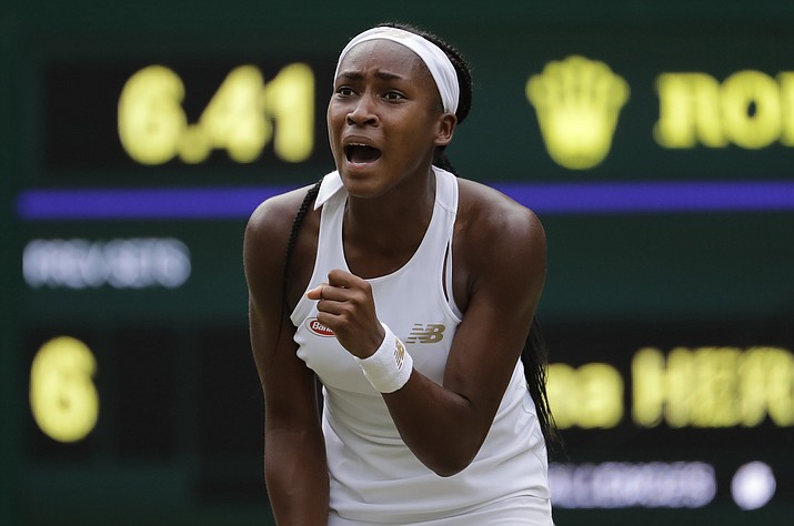 United States' Cori "Coco" Gauff reacts after winning a point against Slovenia's Polona Hercog in a Women's singles match during day five of the Wimbledon Tennis Championships in London, Friday, July 5, 2019. (Ben Curtis/AP)