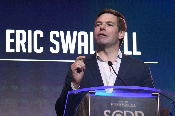 FILE - In this June 22, 2019, file photo, Rep. Eric Swalwell, D-Calif., speaks to the South Carolina Democratic Party convention in Columbia, S.C. Swalwell is ending his presidential bid, becoming the first candidate in the crowded 2020 Democratic primary to exit the campaign. (AP Photo/Meg Kinnard)