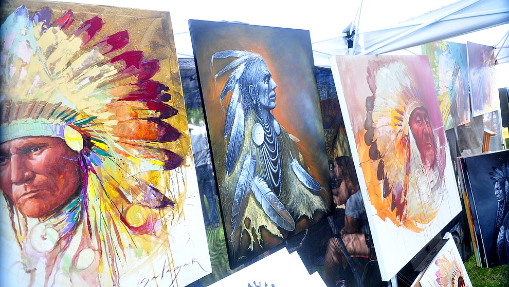 Navajo painter Jeremy Salazar's work on display at the Prescott Indian Arts Market at the Sharlot Hall Museum Saturday July 13, 2019. For a short video of the event go to dCourier.com..The show continues Sunday. (Les Stukenberg/Courier)