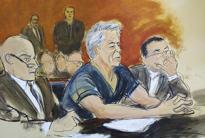In this courtroom artist's sketch, defendant Jeffrey Epstein, center, sits with attorneys Martin Weinberg, left, and Marc Fernich during his arraignment in New York federal court, Monday, July 8, 2019. Epstein pleaded not guilty to federal sex trafficking charges. The 66-year-old is accused of creating and maintaining a network that allowed him to sexually exploit and abuse dozens of underage girls from 2002 to 2005. (Elizabeth Williams via AP)