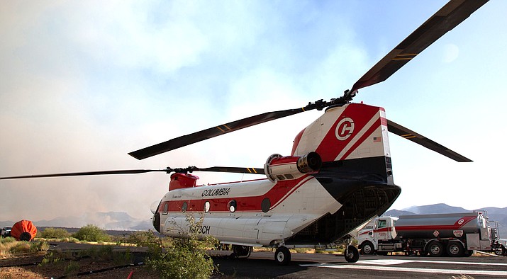 The Woodbury Fire near Superior began June 8 and now is 90% contained. Firefighters employed a CH47D helicopter, which carries a water bucket that holds up to 2,800 gallons, to battle the blaze. (Photo by Anton L. Delgado/News21)
