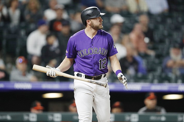This May 25, 2019, file photo shows Colorado Rockies pinch-hitter Mark Reynolds reacting after striking out against Baltimore in Denver. Reynolds was cut by the Colorado Rockies Sunday, July 21, 2019, two home runs shy of 300 after hitting .170 with four homers and 20 RBIs in limited at-bats. (David Zalubowski/AP, File)