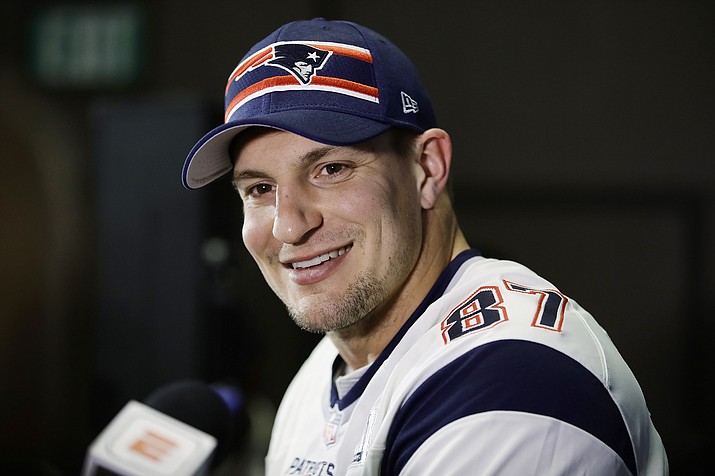 In this Jan. 30, 2019 file photo New England Patriots' Rob Gronkowski speaks with members of the media during a news conference ahead of the NFL Super Bowl 53 football game against Los Angeles Rams in Atlanta. (Matt Rourke/AP, file)