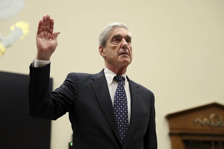 Former special counsel Robert Mueller, is sworn in before he testifies before the House Judiciary Committee hearing on his report on Russian election interference, on Capitol Hill, in Washington, Wednesday, July 24, 2019. (AP Photo/Andrew Harnik)