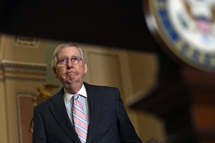 Senate Majority Leader Mitch McConnell of Ky., arrives to speak with reporters following the weekly policy lunches on Capitol Hill in Washington, Tuesday, July 23, 2019. Former special counsel Robert Mueller's warning that Russian interference is still happening "as we sit" is putting pressure on Republican leaders in Congress to join Democrats in passing additional election security legislation. (AP Photo/Susan Walsh)