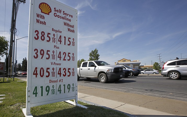 This April 23, 2019 file photo shows gas prices are displayed at a Shell station in Sacramento, Calif. Four major automakers have reached a secret deal with California to increase gas mileage and greenhouse gas emissions standards, bypassing the Trump administration’s plan to freeze standards at 2021 levels, according to two people briefed on the matter. (AP Photo/Rich Pedroncelli, File)