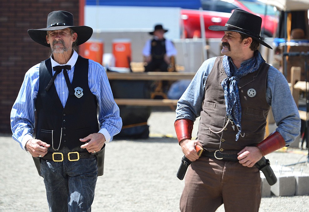 The Superstition Mountain Regulators perform a skit the Whiskey Row Shootout in downtown Prescott Saturday July 27, 2019. (Les Stukenberg/Courier)